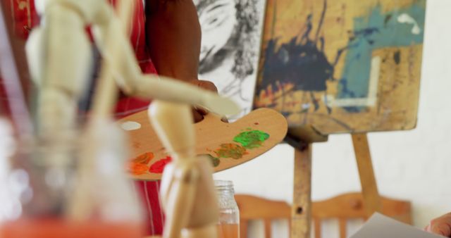 Artist Painting with Colorful Palette in Studio - Download Free Stock Images Pikwizard.com