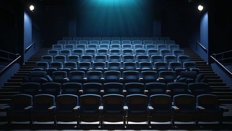 Cinema auditorium empty with spotlight on seats