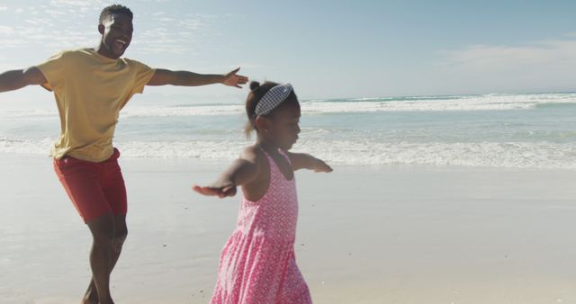 Father and Daughter Enjoying Time at Sunny Beach - Download Free Stock Images Pikwizard.com