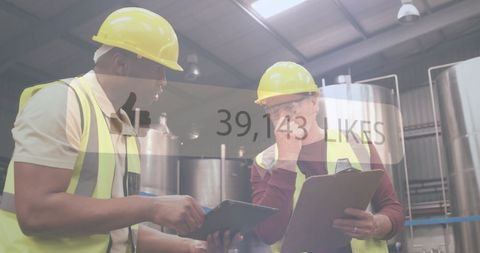 Industrial Workers Discussion Modern Technology Overlaying Social Media - Download Free Stock Images Pikwizard.com
