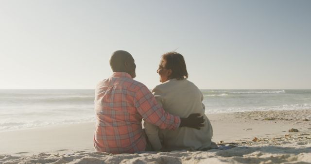 Senior Couple Embracing on Beach Enjoying Sunny Day - Download Free Stock Images Pikwizard.com