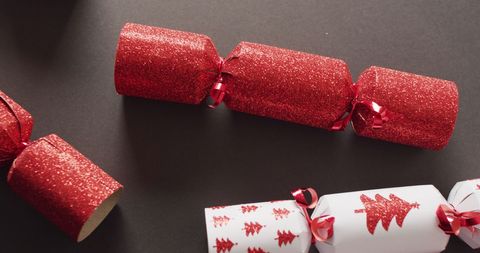 Festive Christmas Crackers on Dark Gray Background for Holiday Celebrations