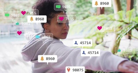 Woman Engaging with Floating Social Media Icons Outdoors