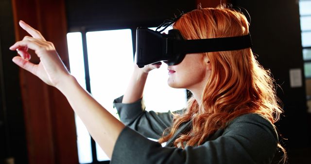 Woman Explore Virtual Reality with VR Headset Indoors - Download Free Stock Images Pikwizard.com