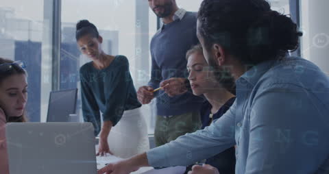 Team Collaborating on Cybersecurity Strategy in Modern Office