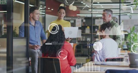 Innovative Business Team Analyzing Data in Modern Office Setting