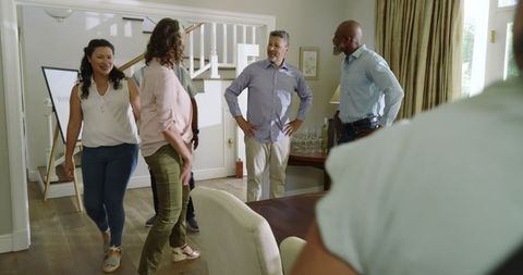 Diverse Group of Senior Friends Celebrating at Home