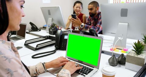 Inclusive Team Working in Modern Office with Technology