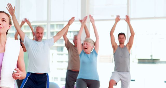 Senior Group Practicing Yoga Poses in Studio - Download Free Stock Images Pikwizard.com