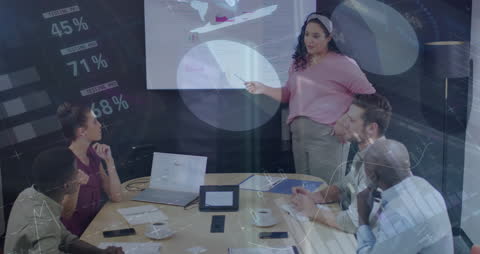 Diverse Team Analyzing Data in Office Setting