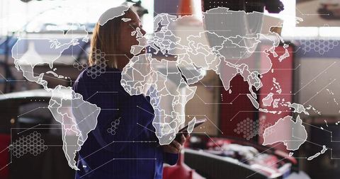 Businesswoman tapping tablet with global map and hexagonal data overlay for analytics