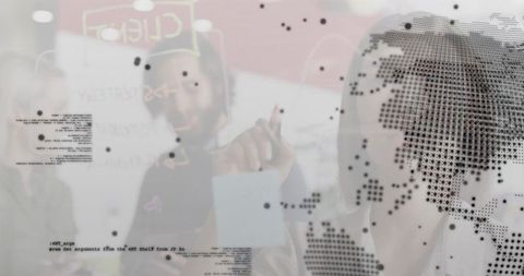 Team collaboration in modern tech office with data overlay