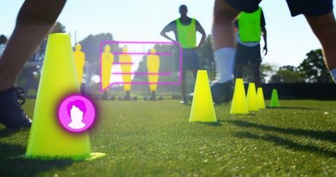Soccer Team Practicing Agility Drills with Training Cones