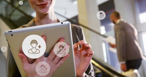 Businesswoman networking on digital tablet