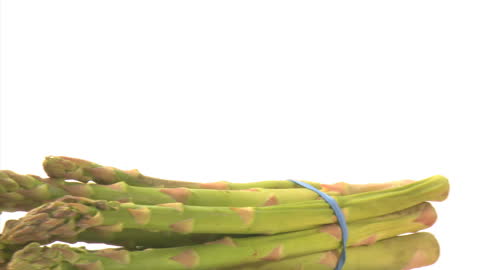 Fresh Green Asparagus Spears on White