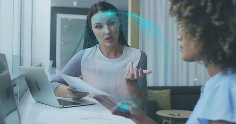 Two Businesswomen in Tech-Infused Business Meeting