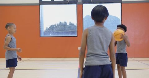 Boys Playing Basketball in School Gymnasium - Download Free Stock Images Pikwizard.com