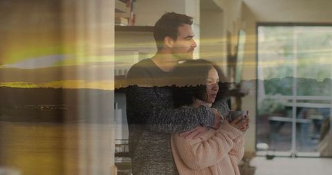 Couple Embracing with Tranquil Sunset Overlay