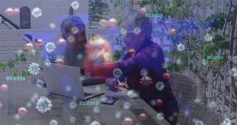 Data and Virus Visualization Over Senior Couple Using Laptop