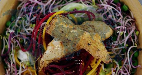 Healthy grilled chicken with colorful spiralized vegetables and microgreens