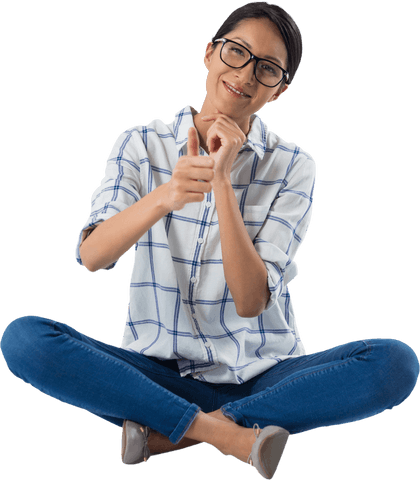 Smiling Woman Sitting Cross-Legged Showing Thumbs Up on Transparent Background