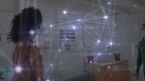 People in Healthcare Setting Connected by Digital Network