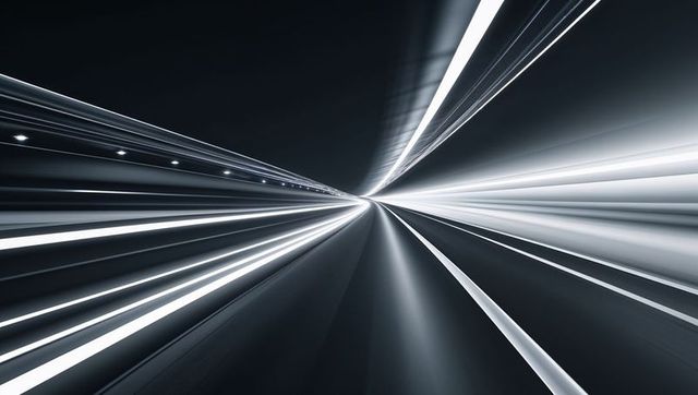 Futuristic neon light streaks in high-speed tunnel