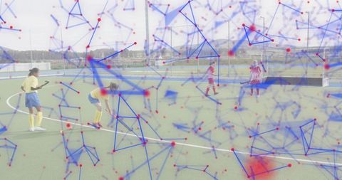 Field hockey players competing on turf with blue data network overlay and sports analytics concept
