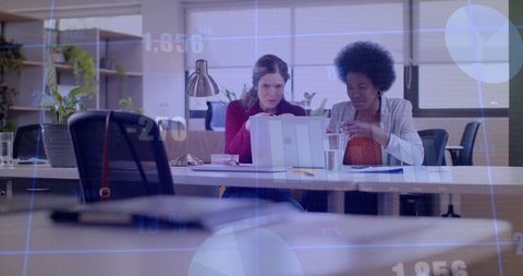 Colleagues Analyzing Financial Data in Office with Overlays