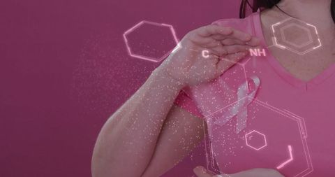 Woman with Pink Ribbon and Scientific Diagrams Emphasizing Breast Cancer Awareness
