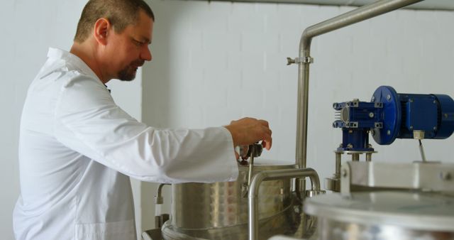 Brewery Engineer Monitoring Brewing Equipment for Quality Control - Download Free Stock Images Pikwizard.com