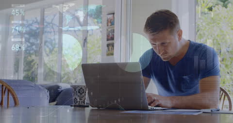 Focused Man Analyzing Data with De-saturated Overlay of Graphs