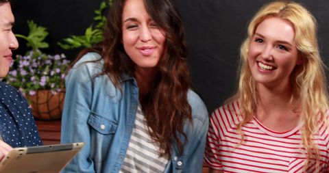 Cheerful Young Adults Enjoying Social Gathering