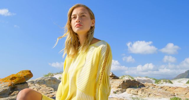 Young Woman Enjoying Sunny Day at Rocky Beach - Download Free Stock Images Pikwizard.com