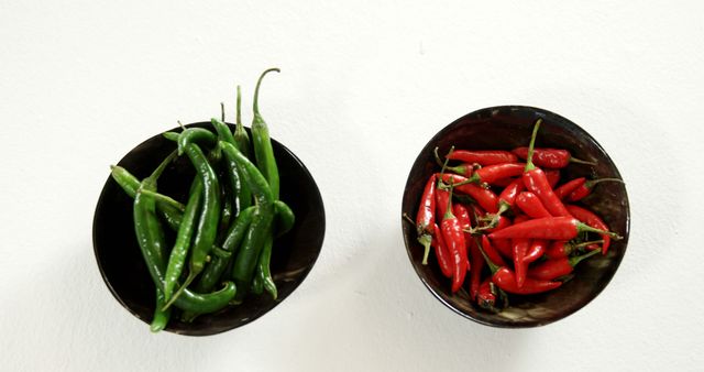 Colorful Green and Red Chili Peppers in Bowls - Download Free Stock Images Pikwizard.com