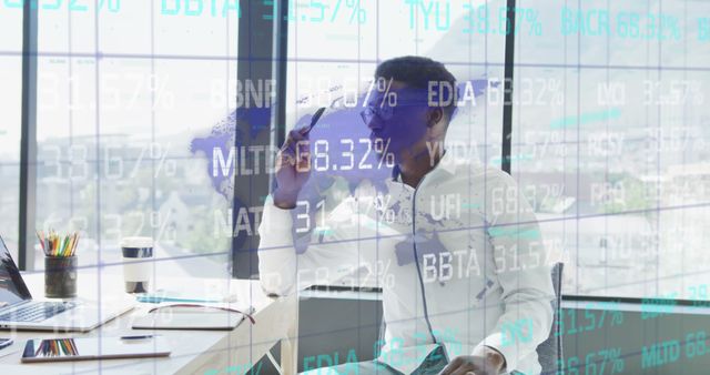 Businessman working in modern office with stock market data overlay, indicating analysis of financial markets. Ideal for themes related to finance, technology, business operations, and market analysis. Can be used for presentations, blogs, and websites discussing corporate finance, investment strategies, and stock market trends.