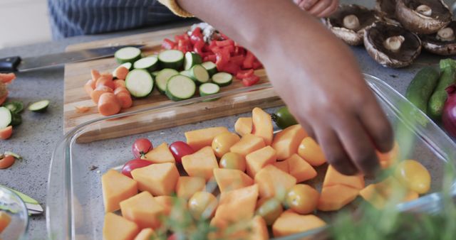 Person Chopping Vegetables and Preparing a Healthy Meal in Kitchen - Download Free Stock Images Pikwizard.com