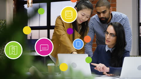 Diverse Team Collaborating on Tech Project with Digital Icons