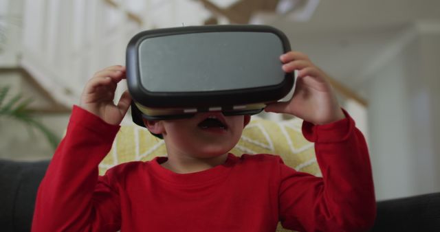 Young Child Experiencing Virtual Reality at Home - Download Free Stock Images Pikwizard.com