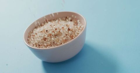 Organic salt bowl against blue backdrop