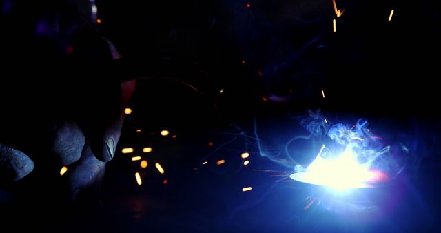 Worker Welding Metal with Bright Sparks - Download Free Stock Images Pikwizard.com