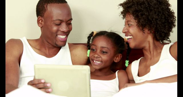 Happy Family Watching Movie on Tablet at Home - Download Free Stock Images Pikwizard.com