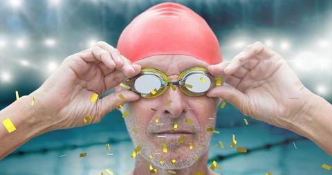 Senior Athlete Celebrating in Pool with Confetti and Swimming Cap - Download Free Stock Images Pikwizard.com