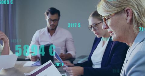 Multigenerational family reviewing finances digitally enhanced