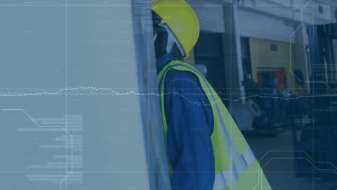 Worker in Safety Gear Inspecting Equipment with Data Overlay
