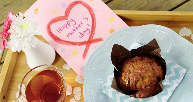 Mother's Day Breakfast in Bed with Cupcake and Tea - Download Free Stock Images Pikwizard.com