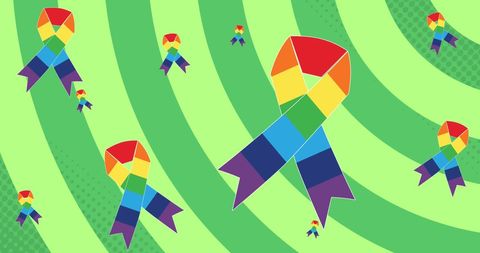 Colorful abstract rainbow ribbons on green striped background