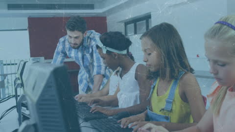Teacher Supervising Students Using Computers in Classroom