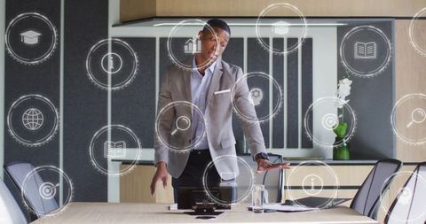 African american businessman interacting with futuristic digital interfaces