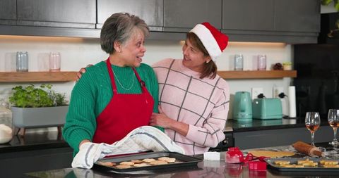 Mother and Daughter Baking Christmas Cookies Together